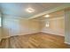 Bedroom with hardwood flooring, neutral walls, and abundant natural light at 24 Echo Ridge Dr, Powder Springs, GA 30127