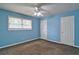 Comfortable bedroom with a window and closet for storage at 24 Echo Ridge Dr, Powder Springs, GA 30127