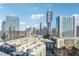 Expansive city view showcasing a skyline of modern high-rise buildings on a clear sunny day at 3325 Piedmont Ne Rd # 1708, Atlanta, GA 30305