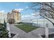 Well-maintained dog park featuring artificial turf and secure fencing, perfect for pet owners at 3325 Piedmont Ne Rd # 1708, Atlanta, GA 30305