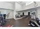 Well-equipped fitness center featuring a variety of machines, weights, and mirrored walls for comprehensive workouts at 3325 Piedmont Ne Rd # 1708, Atlanta, GA 30305
