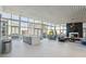 Elegant living area featuring modern design, open floor plan, and floor to ceiling windows with city views at 3325 Piedmont Ne Rd # 1708, Atlanta, GA 30305