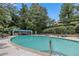 Refreshing pool area with lounge chairs and a shaded cabana, ideal for relaxation and outdoor enjoyment at 3530 Piedmont Ne Rd # K8, Atlanta, GA 30305
