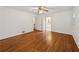 Bedroom with hardwood floors and a door to the bathroom at 4984 Wickford Way, Atlanta, GA 30338