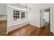 Charming breakfast nook with built-in seating, large windows, and hardwood floors at 4984 Wickford Way, Atlanta, GA 30338