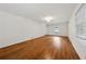 Living room featuring hardwood floors, neutral paint, and natural light at 4984 Wickford Way, Atlanta, GA 30338