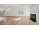Large living room featuring a fireplace and a staircase at 11847 Rizvan Pl, Covington, GA 30014