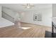 Spacious living room with fireplace and plenty of natural light at 11847 Rizvan Pl, Covington, GA 30014