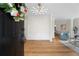 Bright foyer features new light fixture, stylish floors, and fresh paint at 160 Magnolia Walk Ln, South Fulton, GA 30349