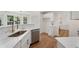 Kitchen with marble countertops, stainless steel appliances, and breakfast bar at 160 Magnolia Walk Ln, South Fulton, GA 30349