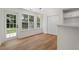 Eat-in kitchen area with backyard views and access to the patio at 160 Magnolia Walk Ln, South Fulton, GA 30349