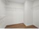 Spacious walk-in closet with wire shelving for optimal storage at 160 Magnolia Walk Ln, South Fulton, GA 30349
