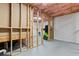 Unfinished basement with exposed framing and insulation, offering potential for future development at 1701 Tipton Nw Ct, Acworth, GA 30101