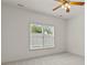 Bedroom featuring a ceiling fan and window to provide natural light and ventilation at 1701 Tipton Nw Ct, Acworth, GA 30101