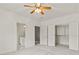 Spacious bedroom featuring an open closet and ensuite bathroom, creating a comfortable retreat at 1701 Tipton Nw Ct, Acworth, GA 30101