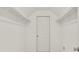 Walk-in closet with built-in white shelving and neutral carpet at 1701 Tipton Nw Ct, Acworth, GA 30101