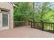 Spacious outdoor deck area with wood railing at 1701 Tipton Nw Ct, Acworth, GA 30101