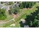 Scenic golf course featuring lush greenery, sand traps, and picturesque walking paths, ideal for recreation and relaxation at 1701 Tipton Nw Ct, Acworth, GA 30101