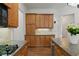 Kitchen with stainless appliances, granite countertops, and wooden cabinets at 1701 Tipton Nw Ct, Acworth, GA 30101