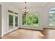 Well-lit living area with French doors to deck and view of yard at 1701 Tipton Nw Ct, Acworth, GA 30101