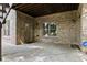 Covered patio with brick walls at 1701 Tipton Nw Ct, Acworth, GA 30101