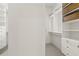 Spacious walk-in closet with custom shelving and drawers for optimal storage and organization at 1701 Tipton Nw Ct, Acworth, GA 30101