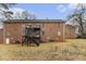 Brick apartment building exterior features multiple units and staircase access to upper levels at 135 E Hill St # 24, Decatur, GA 30030