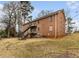 Brick apartment building exterior features multiple units and staircase access to upper levels at 135 E Hill St # 24, Decatur, GA 30030