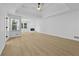 Spacious bedroom with wood floor, fan, tray ceiling, fireplace and lots of light at 400 Hunt River Way, Suwanee, GA 30024
