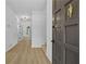 Stylish entryway featuring luxury vinyl flooring, fresh paint, and a new light fixture at 400 Hunt River Way, Suwanee, GA 30024