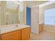 This bathroom features a large mirror and vanity at 375 Shadetree Ln, Lawrenceville, GA 30044
