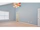 Spacious bedroom features a vaulted ceiling, a ceiling fan, and abundant natural light from a large window at 375 Shadetree Ln, Lawrenceville, GA 30044