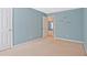 Charming bedroom offering ample natural light and neutral carpeting, creating a comfortable and serene retreat at 375 Shadetree Ln, Lawrenceville, GA 30044