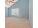 Bright bedroom with vaulted ceiling and large window at 375 Shadetree Ln, Lawrenceville, GA 30044