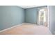 This cozy bedroom features a large window and neutral carpeting, creating a comfortable and relaxing atmosphere at 375 Shadetree Ln, Lawrenceville, GA 30044