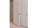 This is a great walk-in closet space with standard doors at 375 Shadetree Ln, Lawrenceville, GA 30044
