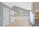 Bright dining area with modern lighting and built-in cabinets at 375 Shadetree Ln, Lawrenceville, GA 30044