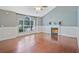 Spacious living room featuring a fireplace and large windows at 375 Shadetree Ln, Lawrenceville, GA 30044