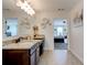Granite counters and double vanities in this bathroom that leads into the main bedroom at 3876 Thackary Dr, Powder Springs, GA 30127