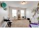 Large room with blue flower wall decor, piano, guitar, and a canopy at 3876 Thackary Dr, Powder Springs, GA 30127