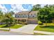 Two-story home with green grass, a two car garage, and a long driveway at 3876 Thackary Dr, Powder Springs, GA 30127