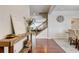 Elegant foyer with hardwood floors, decor, and staircase at 3876 Thackary Dr, Powder Springs, GA 30127