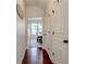 Hallway with hardwood flooring leading to the dining room at 3876 Thackary Dr, Powder Springs, GA 30127