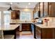 Modern kitchen with stainless steel appliances, granite countertops, and a center island at 3876 Thackary Dr, Powder Springs, GA 30127