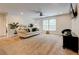 Bright living room featuring neutral walls, carpet, ceiling fan, and natural light at 3876 Thackary Dr, Powder Springs, GA 30127
