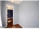Hallway featuring hardwood floors at 5040 Puritan Dr, Sugar Hill, GA 30518