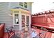 Enjoy relaxing on this covered deck featuring a table with seating at 5040 Puritan Dr, Sugar Hill, GA 30518
