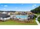 Resort style community pool with ample lounge seating and cabana area at 577 Silver Moon Dr, Loganville, GA 30052