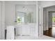 Bathroom features a long vanity, large mirror and a glass shower at 1640 Kenai Rd, Kennesaw, GA 30152
