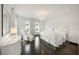 Bright bedroom featuring hardwood floors and natural light at 1640 Kenai Rd, Kennesaw, GA 30152